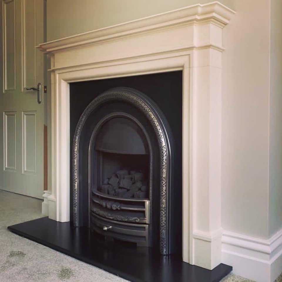 Agean Stone Fireplace With Cast Insert Gas Fire Installed In North Wales